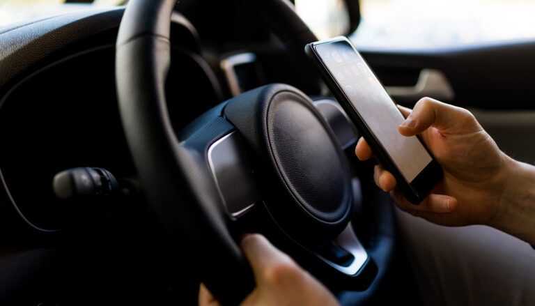 Distracted driver on cell phone